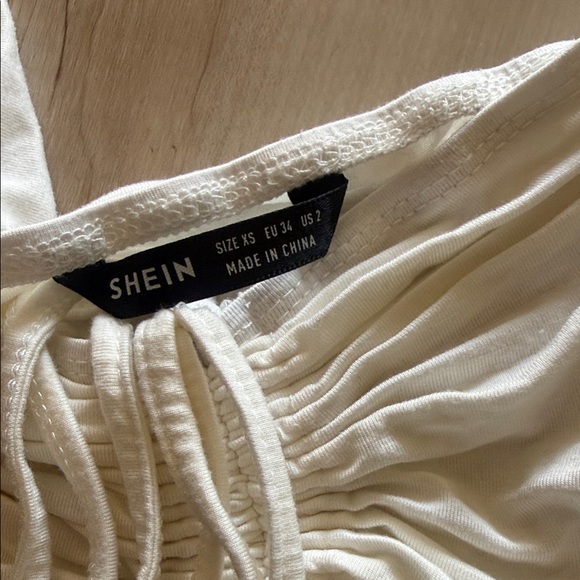 Elegant Cream Off-Shoulder Crop Top - Picture 3 of 3